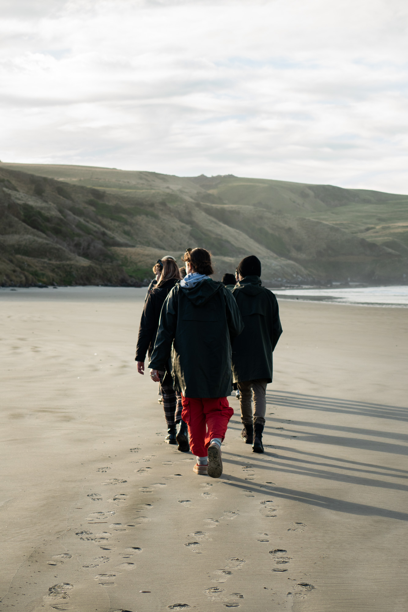 Tour guests on a secluded beach